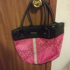 A pink and brown Tommy Hilfiger purse